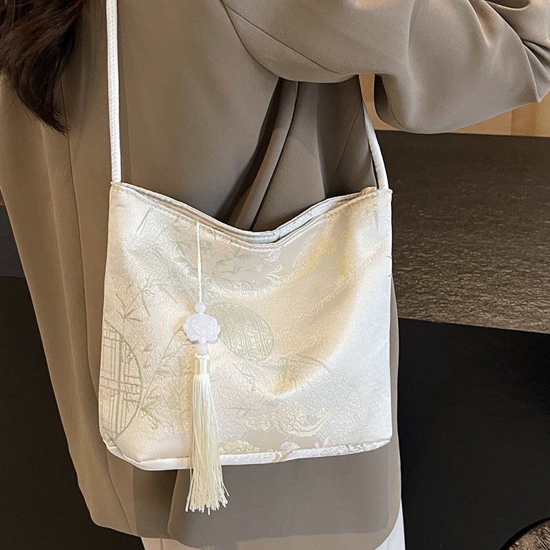 Damen modische Abendtasche aus luxuriösem Material mit dekorativem Quastenanhänger Nord Taschen