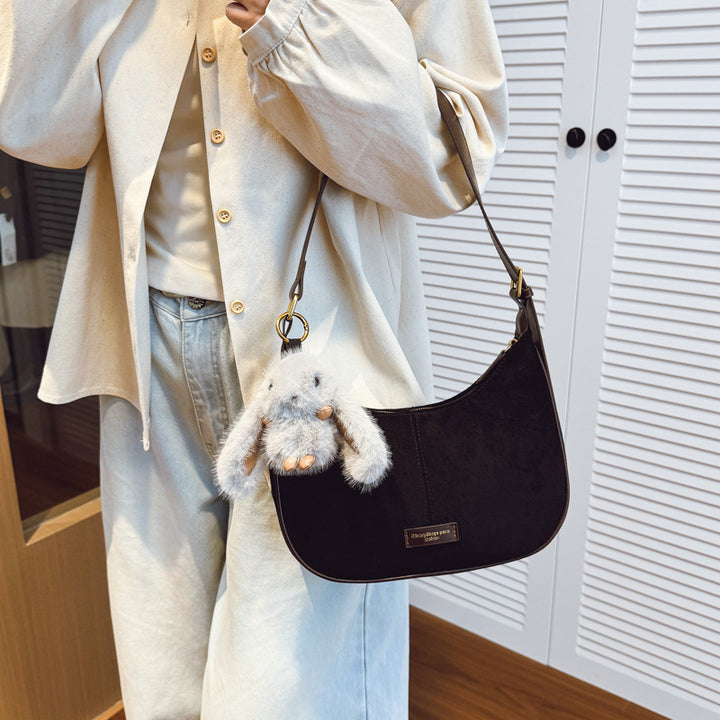 Damen modische Schultertasche mit flauschigem Anhänger Nord Taschen