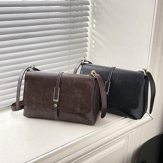 Damen elegante Umhängetasche aus hochwertigem Kunstleder mit zuverlässigem Klappverschluss Nord Taschen