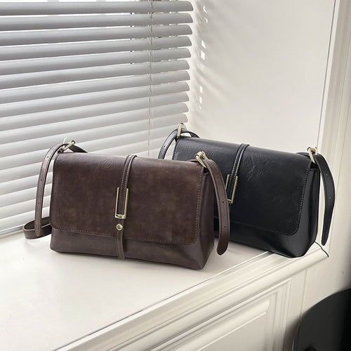 Damen elegante Umhängetasche aus hochwertigem Kunstleder mit zuverlässigem Klappverschluss Nord Taschen