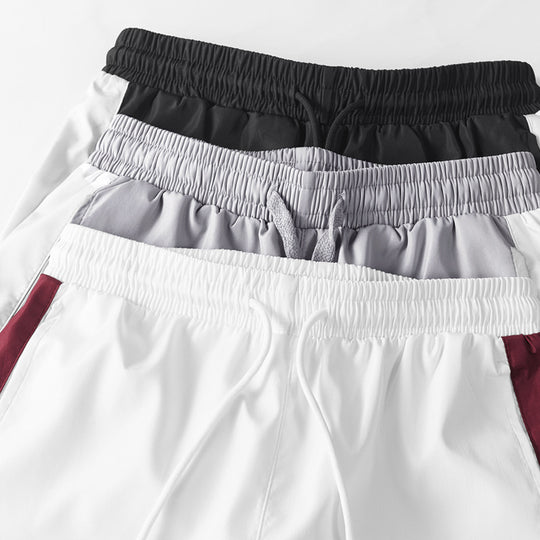 Herren Sportives Freizeit-Trainingsanzug-Set aus leichtem Windbreaker-Material mit Kontraststreifen und reflektierenden Einsätzen Nord Taschen