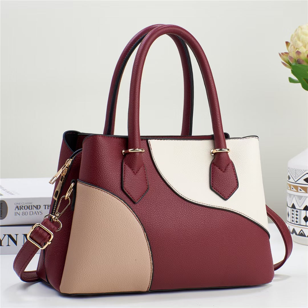 Damen Handtasche mit kreativem Farbdesign und verstellbarem Schulterriemen Nord Taschen