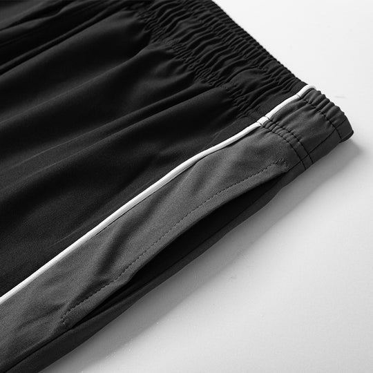 Herren Leichte Trainingshose im Relaxed-Fit mit elastischem Tunnelzugbund und kontrastseitiger Paspel Nord Taschen