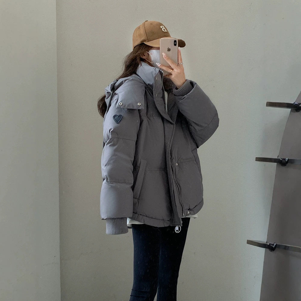 Damen nan oversized gesteppte Kurzjacke mit Kapuze, winddichter Fütterung und übergroßem Kragen Nord Taschen