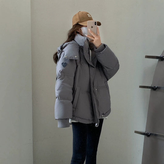 Damen nan oversized gesteppte Kurzjacke mit Kapuze, winddichter Fütterung und übergroßem Kragen Nord Taschen
