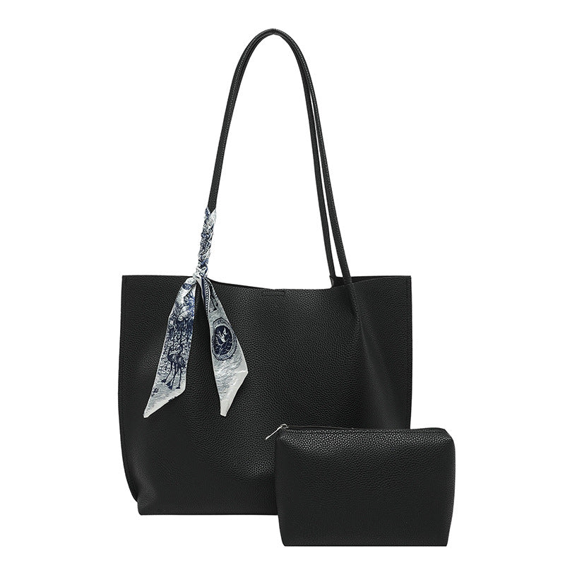Damen elegante Tragetasche mit geschmeidiger Lederstruktur und modischem Schal Nord Taschen