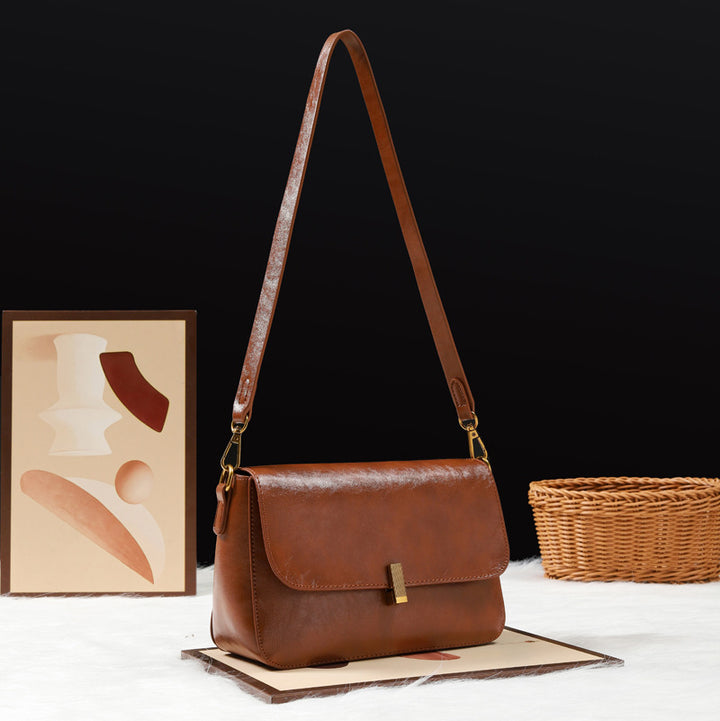 Damen Umhängetasche aus hochwertigem Kunstleder mit elegantem Klappenverschluss Nord Taschen