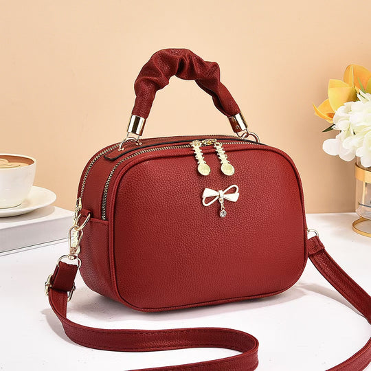Damen Handtasche mit geflochtenem Tragegriff und edlem Zipper Nord Taschen
