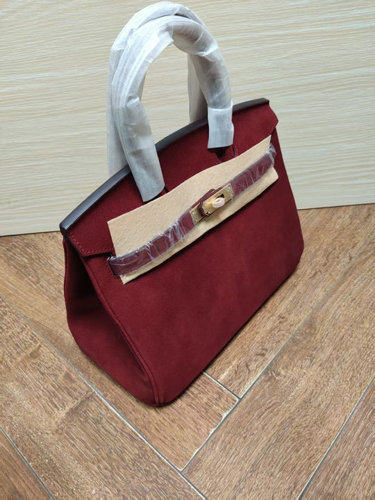 Damen Handtasche aus feinstem Wildleder mit goldfarbenem Verschluss Nord Taschen