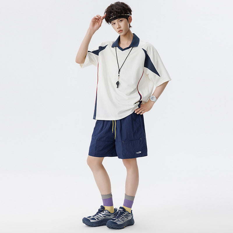Herren Sportives Oversize-Poloshirt mit V-Ausschnitt, Kontrastpaspeln und atmungsaktivem Material Nord Taschen