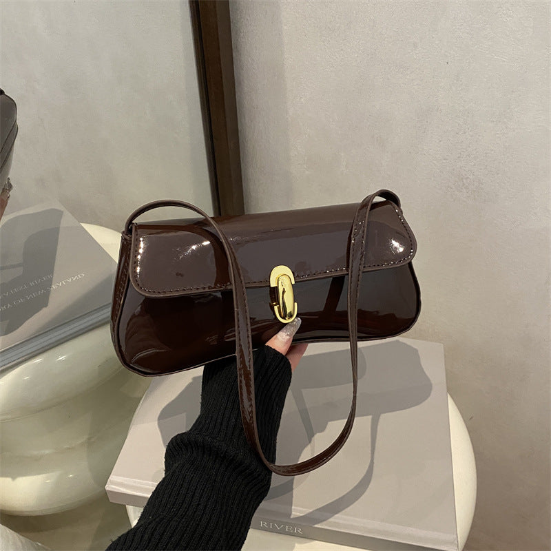 Damen elegante Umhängetasche mit luxuriösem Hochglanzdesign und praktischen Tragegriffen Nord Taschen