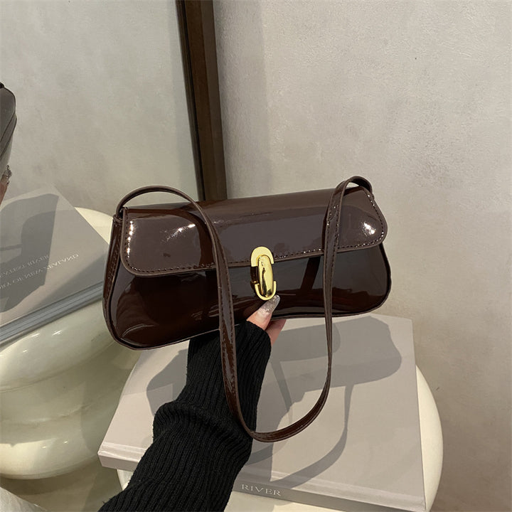 Damen elegante Umhängetasche mit luxuriösem Hochglanzdesign und praktischen Tragegriffen Nord Taschen
