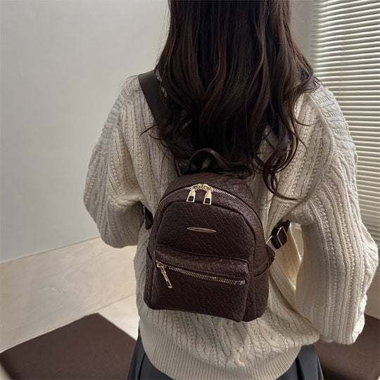Damen Rucksack mit geflochtenem Design und goldenen Akzenten Nord Taschen
