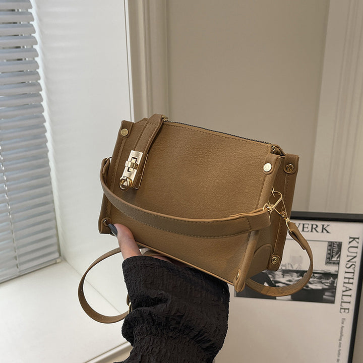 Damen Handtasche mit elegantem Reißverschluss und modernem Detail Nord Taschen