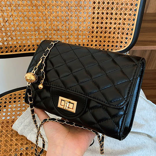 Damen Umhängetasche mit gefüttertem Quiltmuster und Goldakzenten Nord Taschen