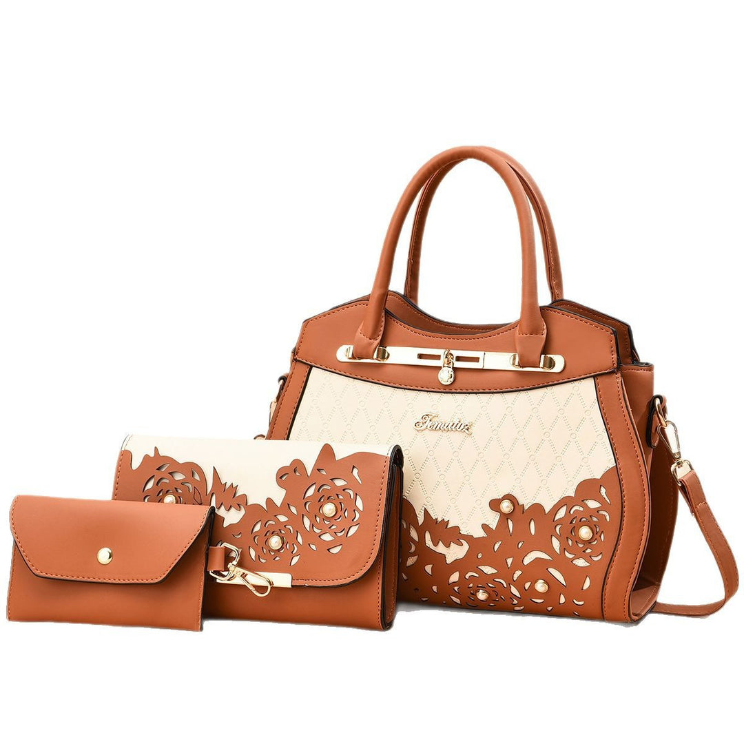 Damen elegante Handtasche mit floralem Ausschnitt Nord Taschen