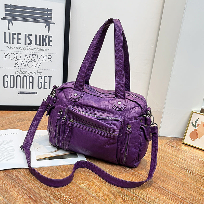 Damen Handtasche mit strukturiertem Design und dekorativen Metallakzenten Nord Taschen