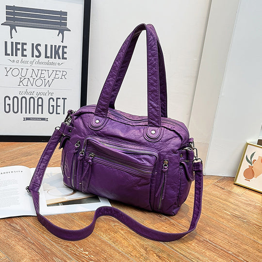 Damen Handtasche mit strukturiertem Design und dekorativen Metallakzenten Nord Taschen