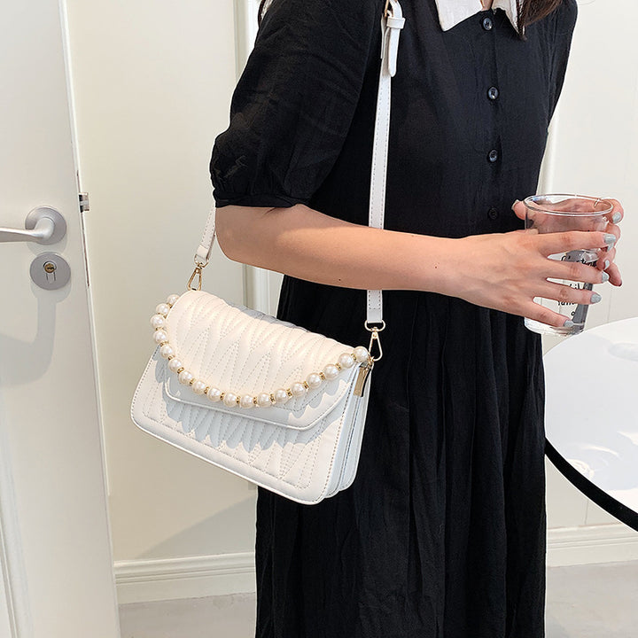 Damen Handtasche mit eleganter Perlenapplikation Nord Taschen