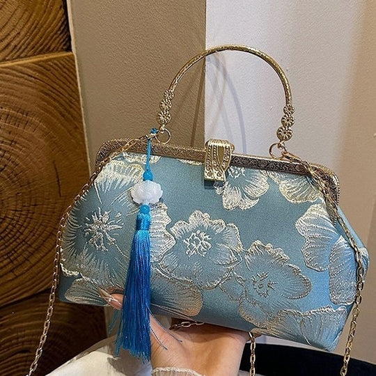Damen elegante Clutch-Tasche mit floralem Druck und goldenen Akzenten Nord Taschen