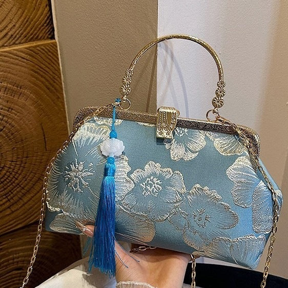 Damen elegante Clutch-Tasche mit floralem Druck und goldenen Akzenten Nord Taschen