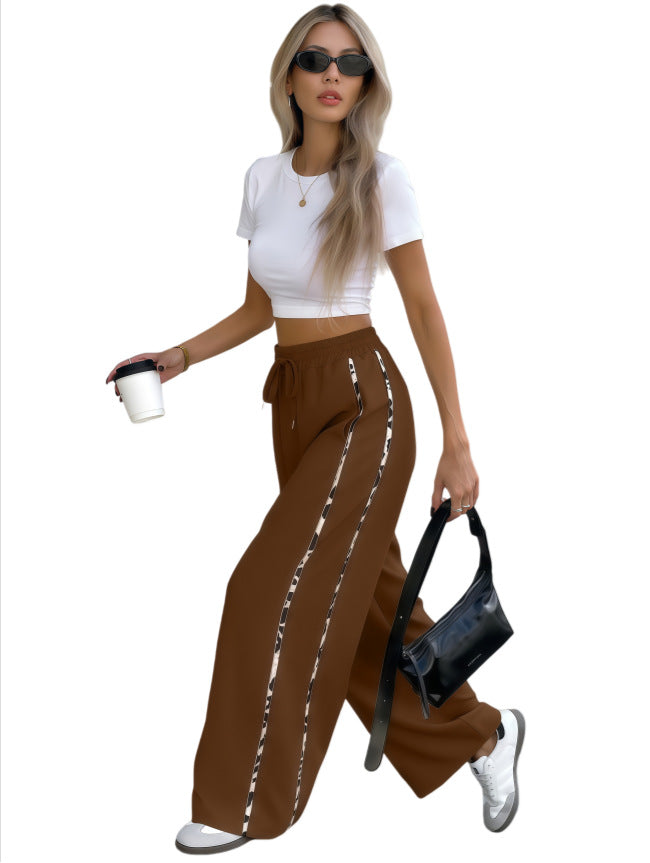 Damen Weite High‑Waist Loungehose mit Kordelzug und kontrastierenden Seitenstreifen Nord Taschen