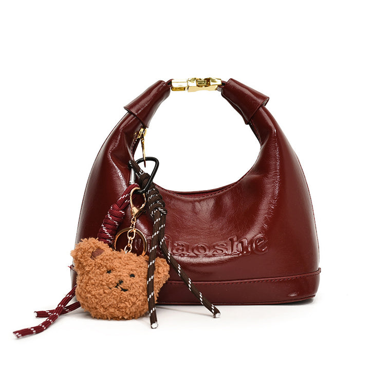 Damen elegante Hobo-Tasche mit plüschigem Anhänger Nord Taschen