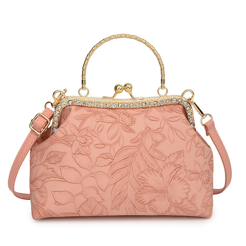 Damen elegante Handtasche mit floralem Relief und goldenen Akzenten Nord Taschen