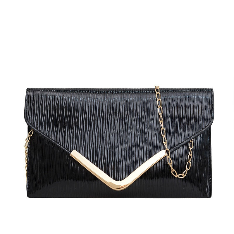 Damen elegante Clutch mit strukturiertem Obermaterial und goldenen Akzenten Nord Taschen