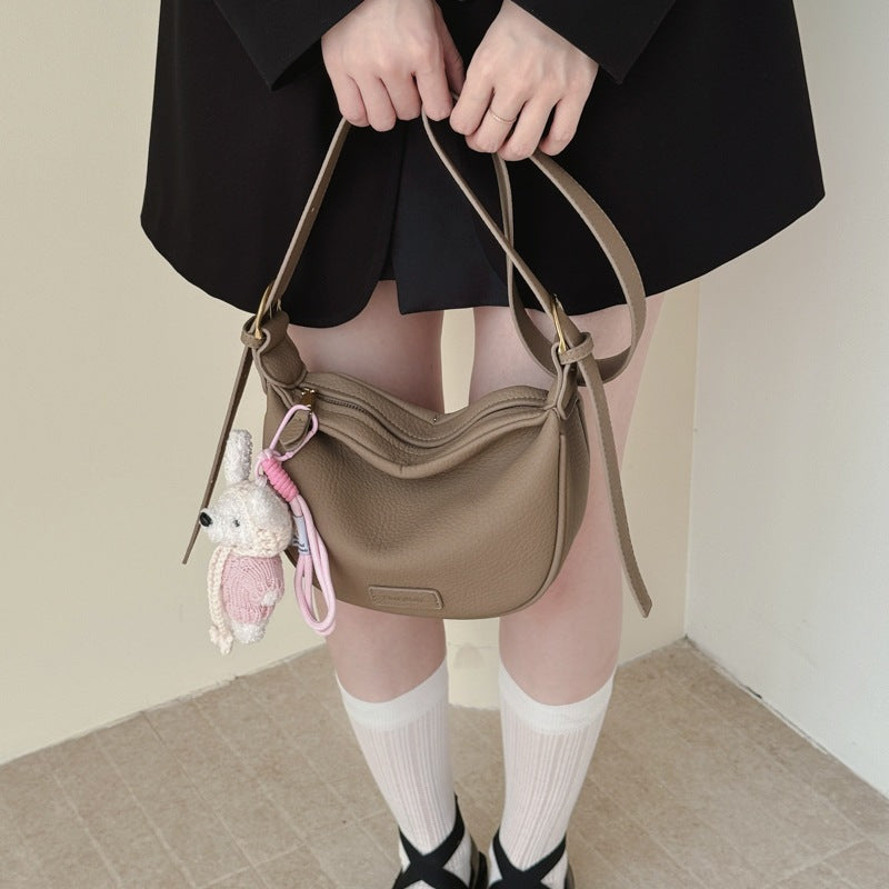 Damen Umhängetasche mit verspielten Tierdetails und modernen Akzenten Nord Taschen