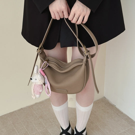 Damen Umhängetasche mit verspielten Tierdetails und modernen Akzenten Nord Taschen