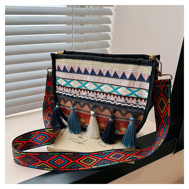 Damen umhängetasche mit kreativem Stickmuster und Quasten Nord Taschen