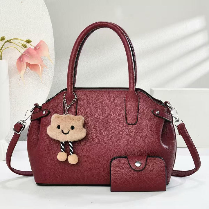 Damen modische Handtasche mit abnehmbarem Zubehör und kreativem Anhänger Nord Taschen