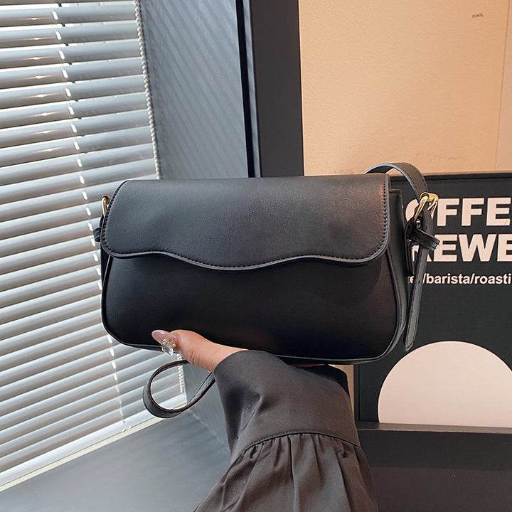 Damen Umhängetasche mit elegantem Wellenmuster Nord Taschen