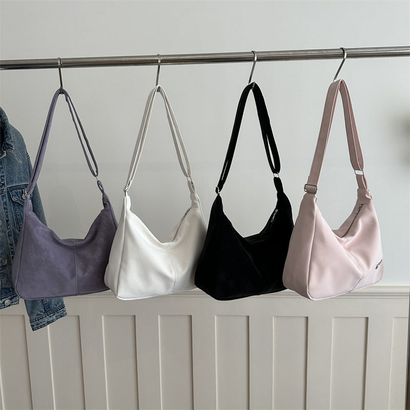 Damen Umhängetasche mit eleganter Struktur und Filterverschluss Nord Taschen