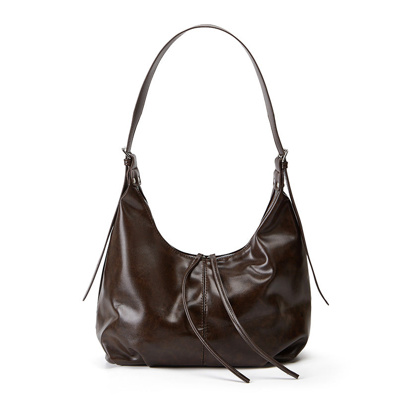 Damen Hobo-Tasche aus geschmeidigem Kunstleder mit flexiblem Tragegriff Nord Taschen
