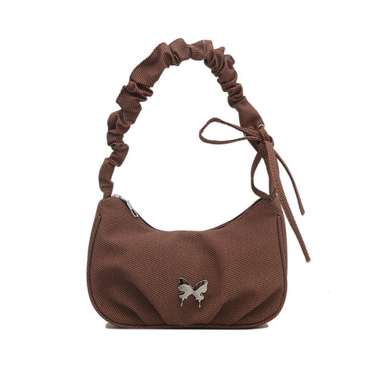 Damen Handtasche mit kreativer Faltentechnik und verspieltem Trageriemen Nord Taschen