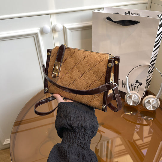Damen elegante Handtasche mit glänzenden Akzenten und praktischem Reißverschluss Nord Taschen