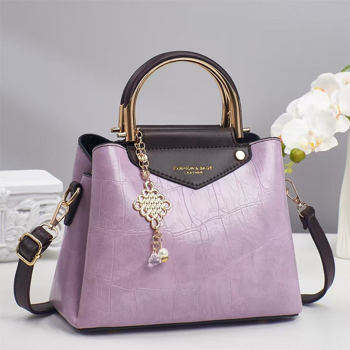 Damen elegante Handtasche mit goldenen Akzenten Nord Taschen