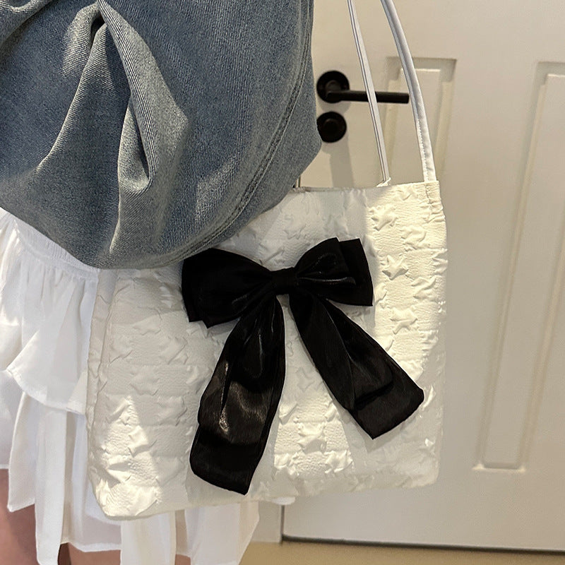 Damen Hobo-Tasche mit dekorativem Schleifenakzent und strukturiertem Design Nord Taschen
