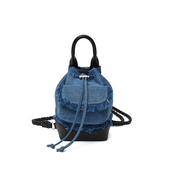 Damen Denim Rucksack mit verspielten Fransen und praktischen Trageoptionen Nord Taschen