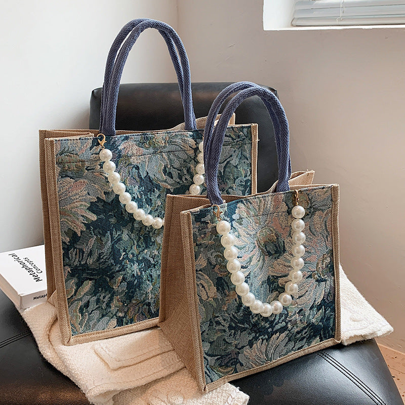 Damen Einkaufstasche mit floralem Jacquard-Muster und eleganter Perlenverzierung Nord Taschen