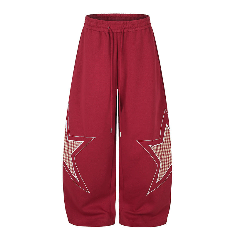 Damen weite Palazzo-Sweathose mit Stern-Applikationen und Karo‑Einsätzen Nord Taschen