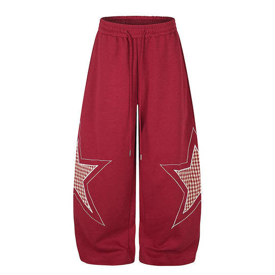 Damen weite Palazzo-Sweathose mit Stern-Applikationen und Karo‑Einsätzen Nord Taschen