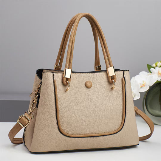 Damen Handtasche mit goldenen Akzenten und eleganter Struktur Nord Taschen