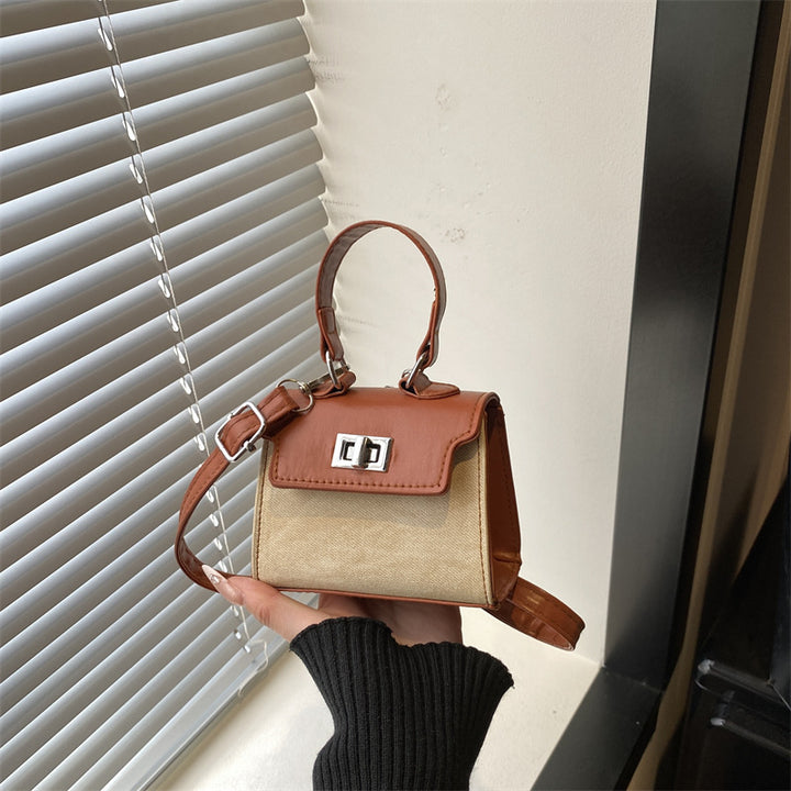 Damen Mini-Handtasche mit luxuriösem Lederlook und praktischen Tragegriffen Nord Taschen