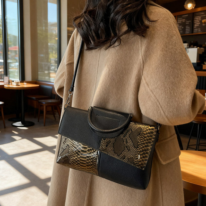 Damen elegante Umhängetasche im modernen Schlangenleder-Look Nord Taschen