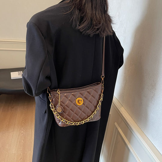 Damen Umhängetasche mit eleganter Steppung und luxuriösem Kettenakzent Nord Taschen
