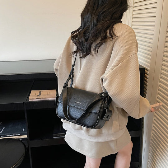 Damen Umhängetasche aus weichem, strukturiertem Leder mit verstellbarem Schulterriemen Nord Taschen