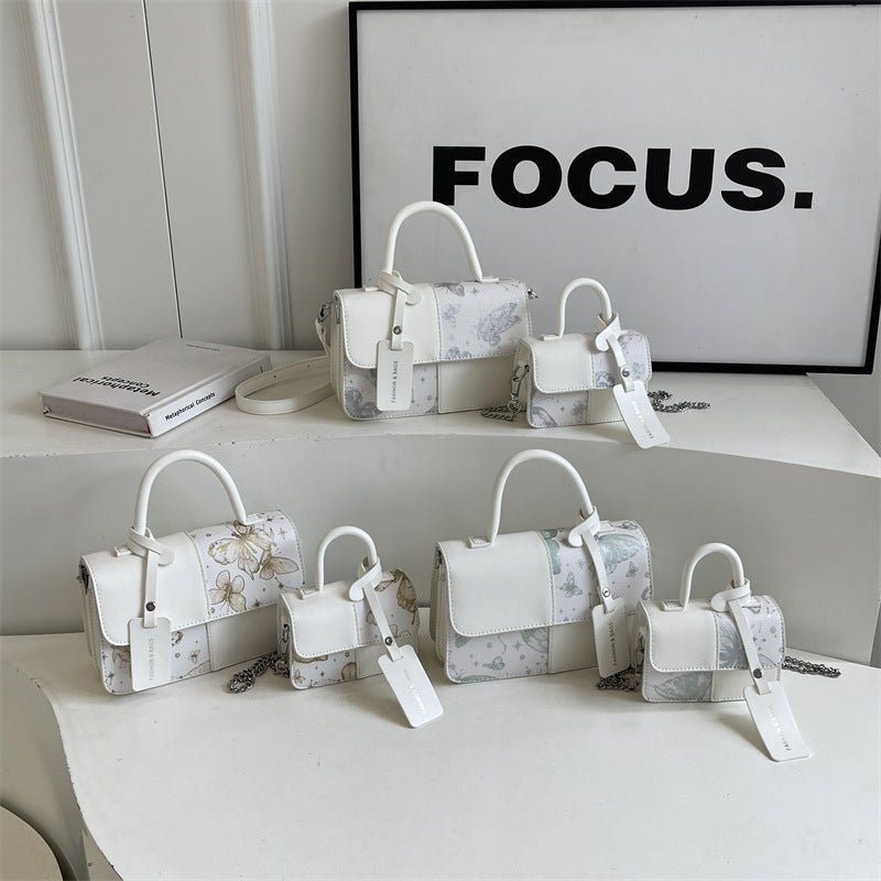Damen mode Handtasche mit floralem Druck und praktischem Tragegriff Nord Taschen